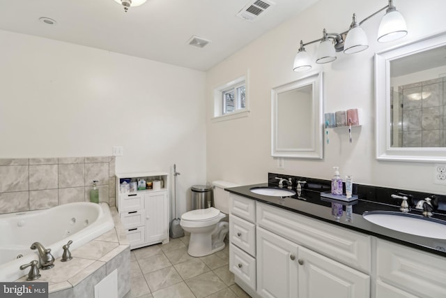 full bath with a jetted tub, visible vents, and a sink