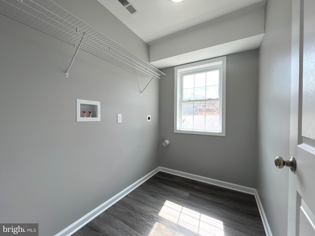 washroom featuring visible vents, baseboards, laundry area, hookup for a washing machine, and electric dryer hookup