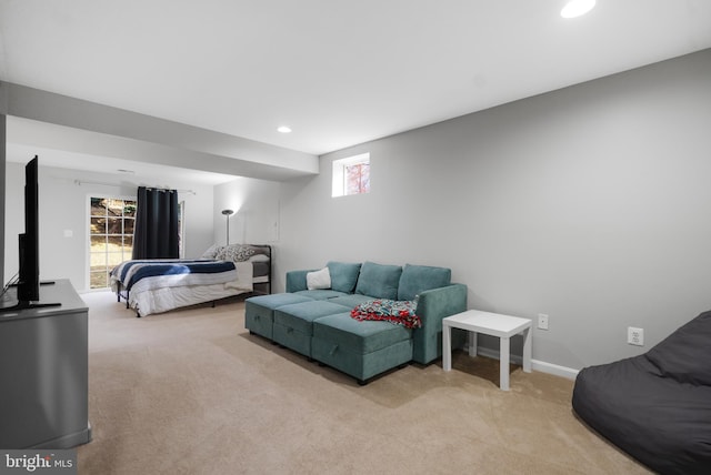 carpeted bedroom featuring recessed lighting and baseboards