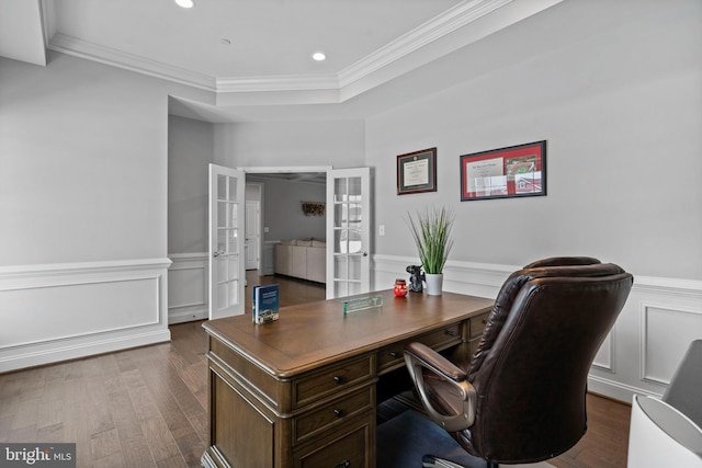 office with recessed lighting, a wainscoted wall, french doors, ornamental molding, and dark wood-style floors