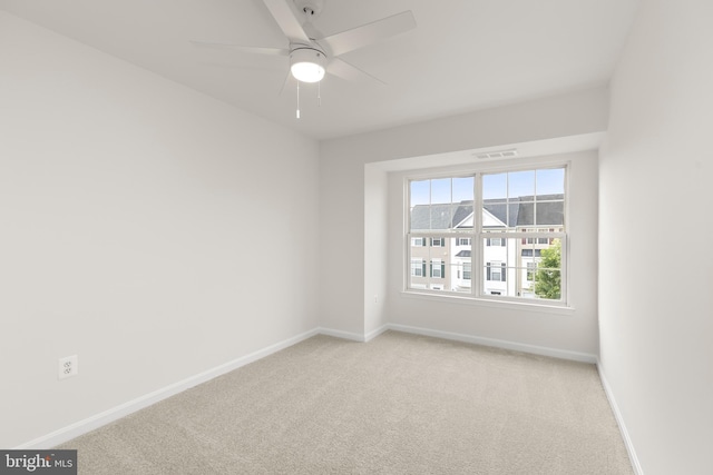 6185 Newton Ln, Bealeton, VA 22712 - unfurnished room featuring light carpet, baseboards, and a ceiling fan