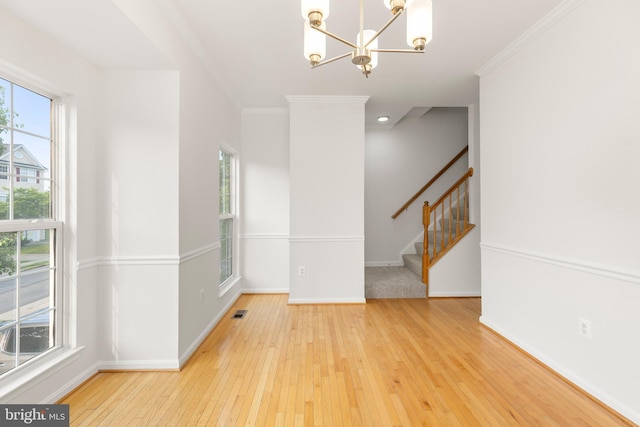 6185 Newton Ln, Bealeton, VA 22712 - spare room featuring a chandelier, baseboards, wood-type flooring, stairway, and ornamental molding