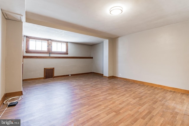 305 Drew St, Baltimore, MD 21224 - unfurnished room with light wood-type flooring and baseboards