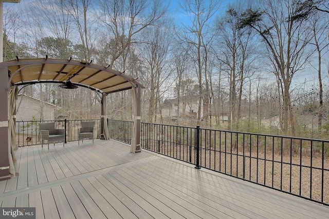 deck featuring ceiling fan