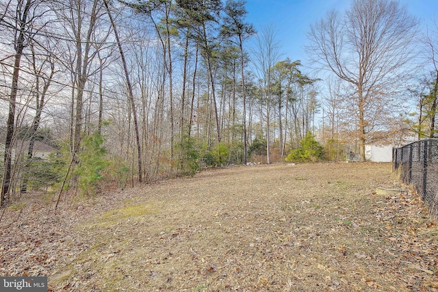 view of yard with fence