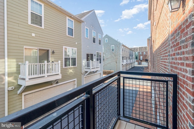 balcony featuring a residential view