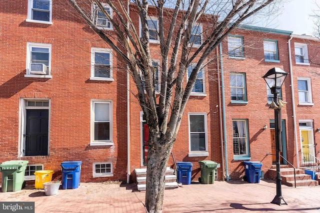 view of building exterior featuring cooling unit