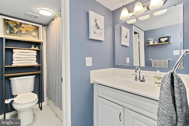 full bath with visible vents, vanity, toilet, and tile patterned floors