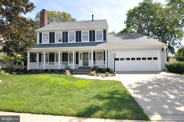 colonial-style house with a garage, a front yard, covered porch, and a chimney