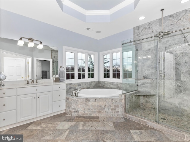 full bath with visible vents, ornamental molding, a shower stall, a bath, and a raised ceiling