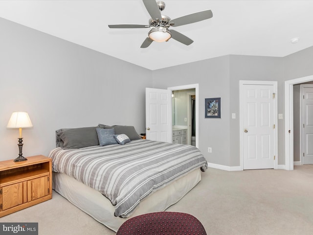 bedroom with light carpet, ceiling fan, and baseboards