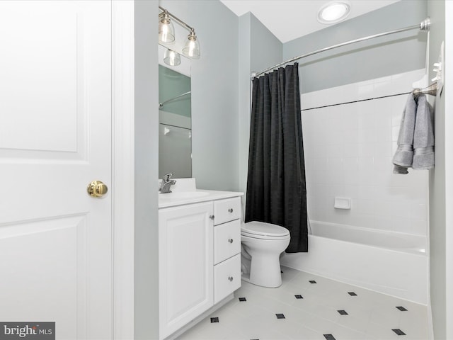 full bath with toilet, shower / bath combination with curtain, and vanity