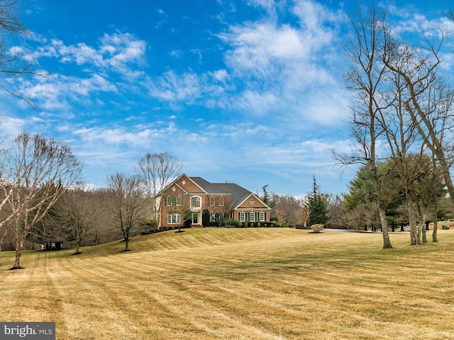 view of front of property with a front lawn