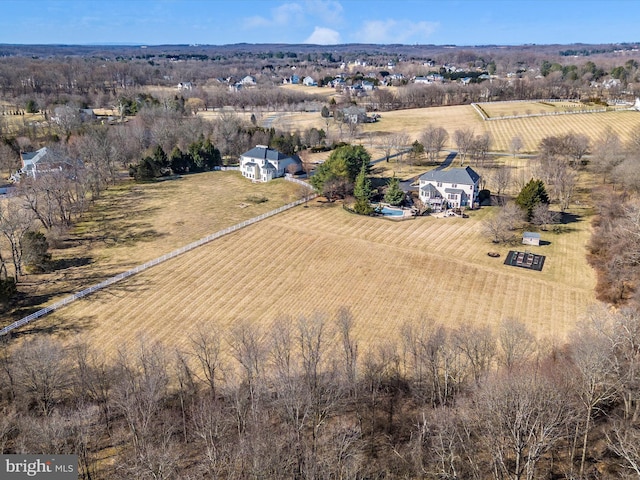 birds eye view of property featuring a rural view