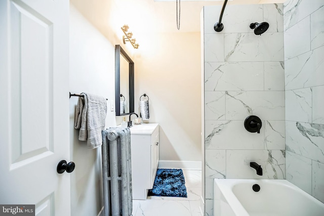 bathroom with washtub / shower combination, baseboards, marble finish floor, and vanity