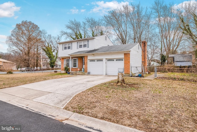 view of front of house with concrete driveway, a chimney, an attached garage, fence, and brick siding