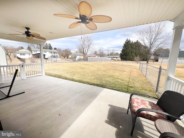 view of patio featuring a fenced backyard and ceiling fan