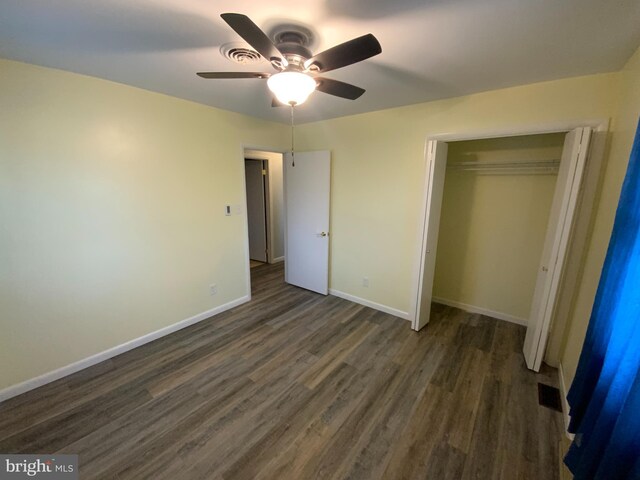 13176 Gearhart Rd, Greencastle, PA 17225 - unfurnished bedroom with dark wood finished floors, visible vents, a closet, and baseboards