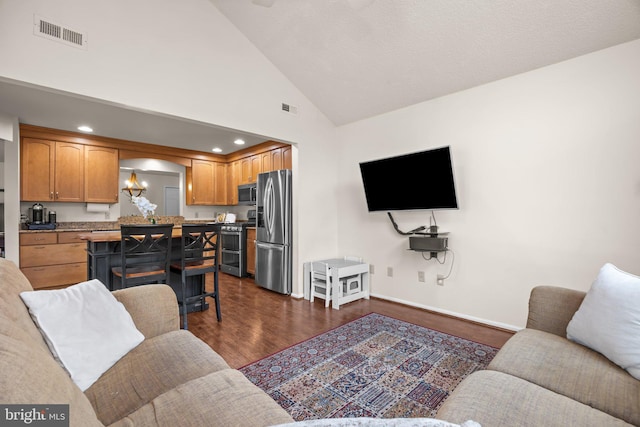 living room with high vaulted ceiling, baseboards, visible vents, and dark wood-style flooring