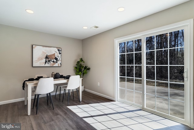 dining space with visible vents, recessed lighting, baseboards, and wood finished floors