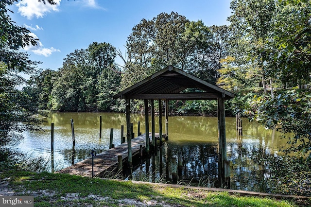 dock area featuring a water view