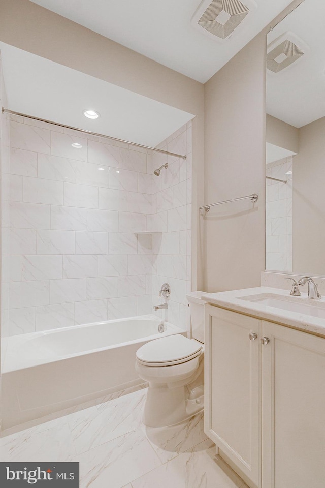 bathroom featuring visible vents, toilet, bathtub / shower combination, and vanity