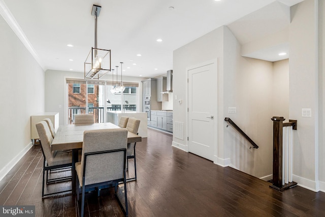 dining area with recessed lighting, dark wood-style floors, and baseboards