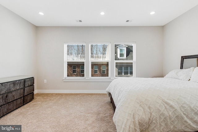 bedroom with recessed lighting, carpet, and baseboards