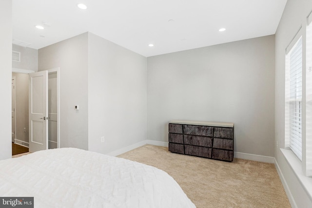 bedroom with carpet flooring, recessed lighting, and baseboards