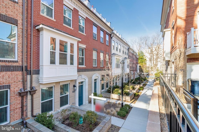 view of building exterior with a residential view