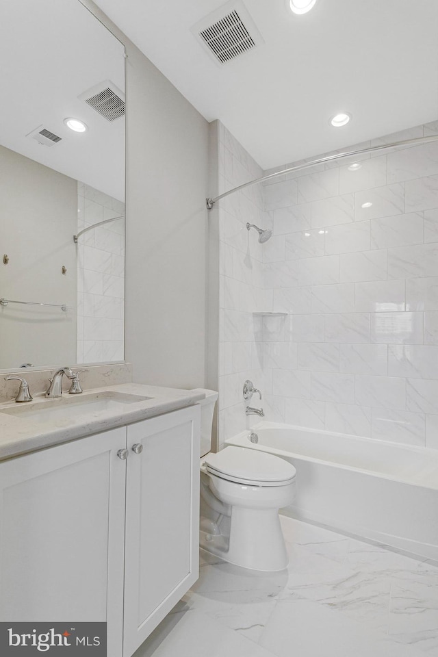 full bathroom featuring vanity, visible vents,  shower combination, toilet, and marble finish floor