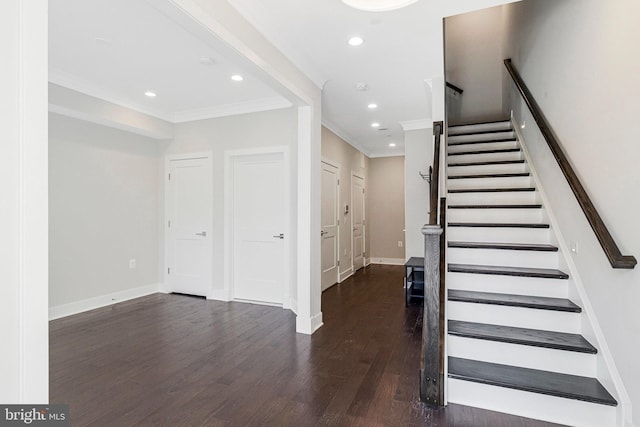 stairway with recessed lighting, ornamental molding, baseboards, and wood finished floors