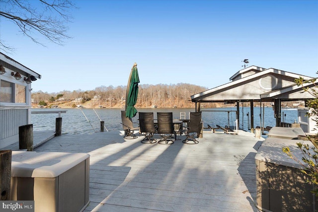 deck featuring a water view and a boat dock