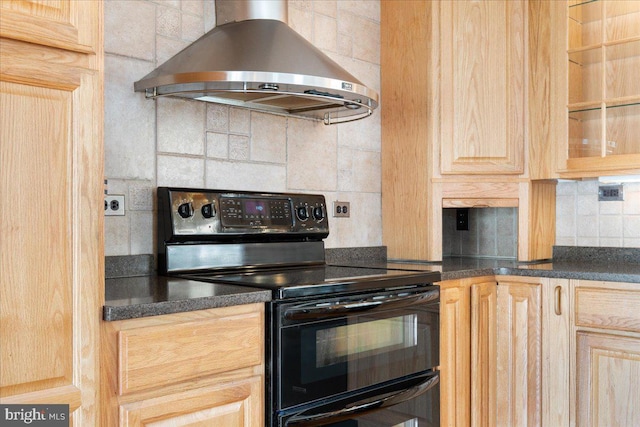 kitchen featuring tasteful backsplash, range hood, black range with electric cooktop, and light brown cabinetry