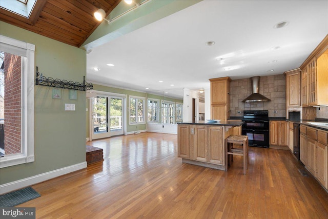 kitchen featuring range with two ovens, wall chimney exhaust hood, dark countertops, backsplash, and dishwashing machine