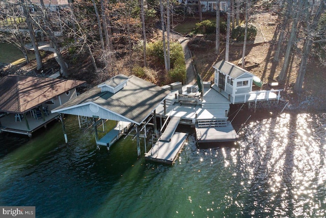 view of dock with a water view and boat lift