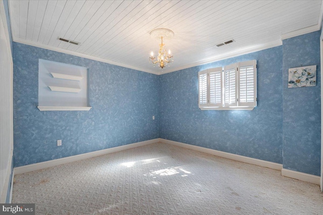 carpeted empty room with wallpapered walls, visible vents, a notable chandelier, and ornamental molding