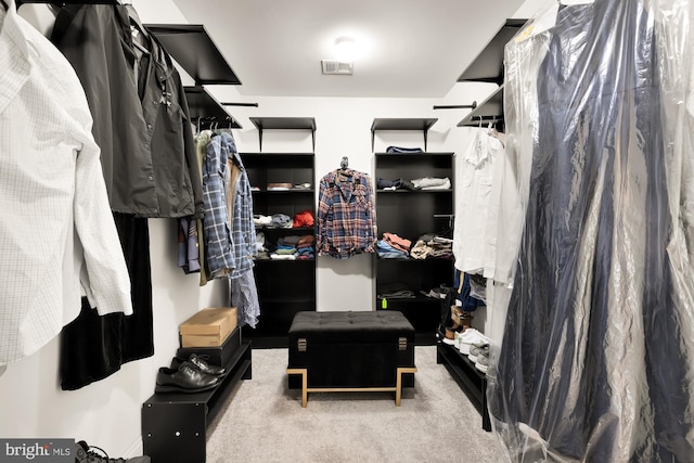 spacious closet with carpet and visible vents