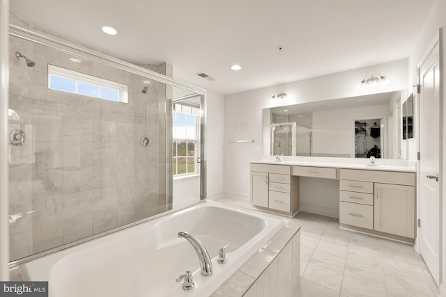 full bath featuring a garden tub, recessed lighting, visible vents, a shower stall, and vanity