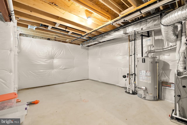 unfinished basement with gas water heater