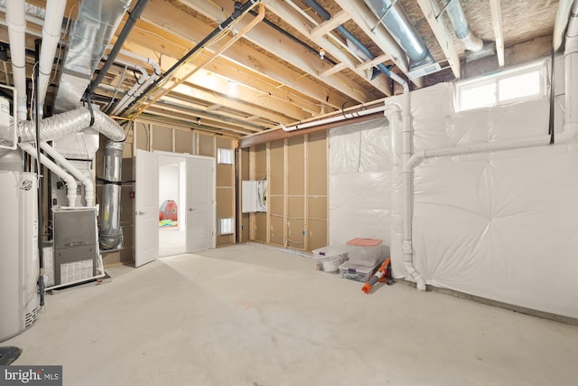 basement featuring gas water heater