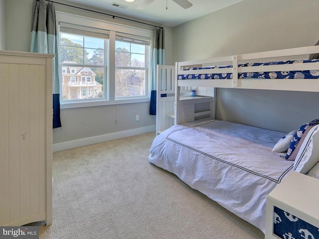 bedroom featuring carpet, visible vents, and baseboards