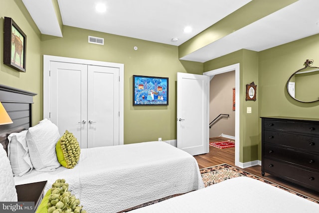 4451 River Ridge Court, Philadelphia, PA 19129 - bedroom with visible vents, baseboards, recessed lighting, wood finished floors, and a closet