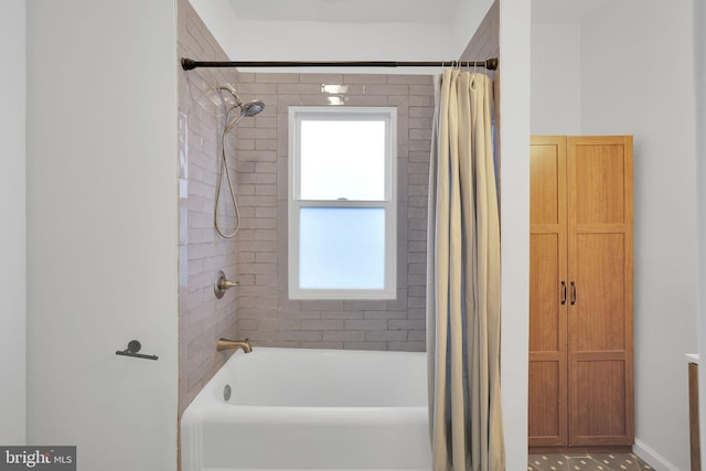 full bath featuring shower / bath combo with shower curtain