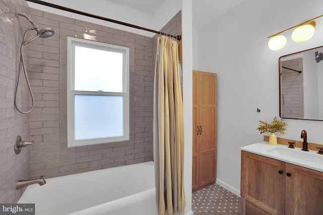 bathroom featuring shower / bath combo and vanity