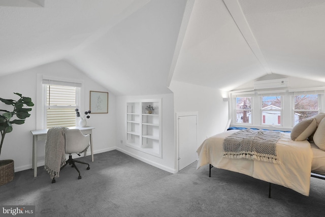 carpeted bedroom with vaulted ceiling and baseboards