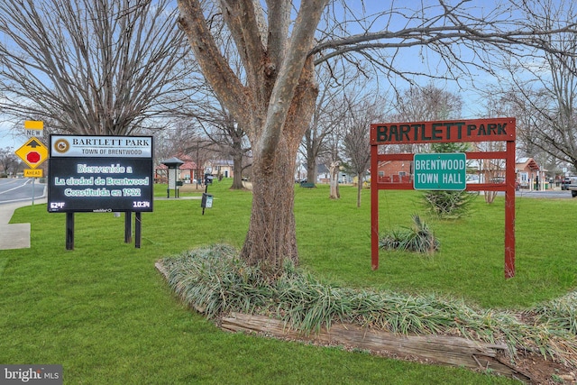 surrounding community featuring a lawn