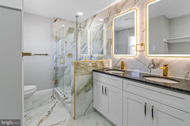 full bathroom featuring a marble finish shower, marble finish floor, a sink, and toilet