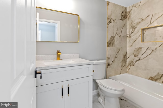 bathroom featuring toilet, marble finish floor,  shower combination, and vanity