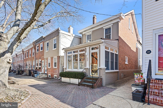 view of property featuring entry steps